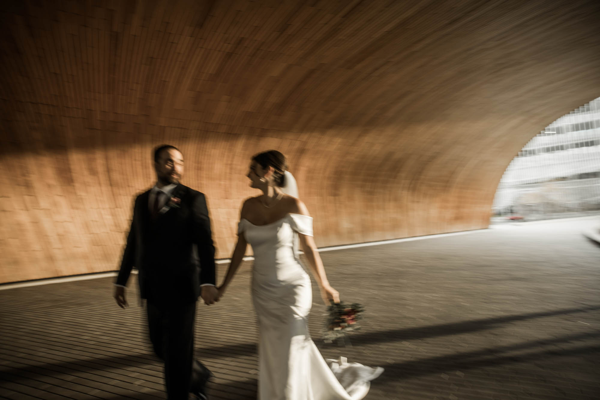 Calgary wedding photographer, bride and groom on their wedding day at the Central Library, candid, documentary, storytelling photography