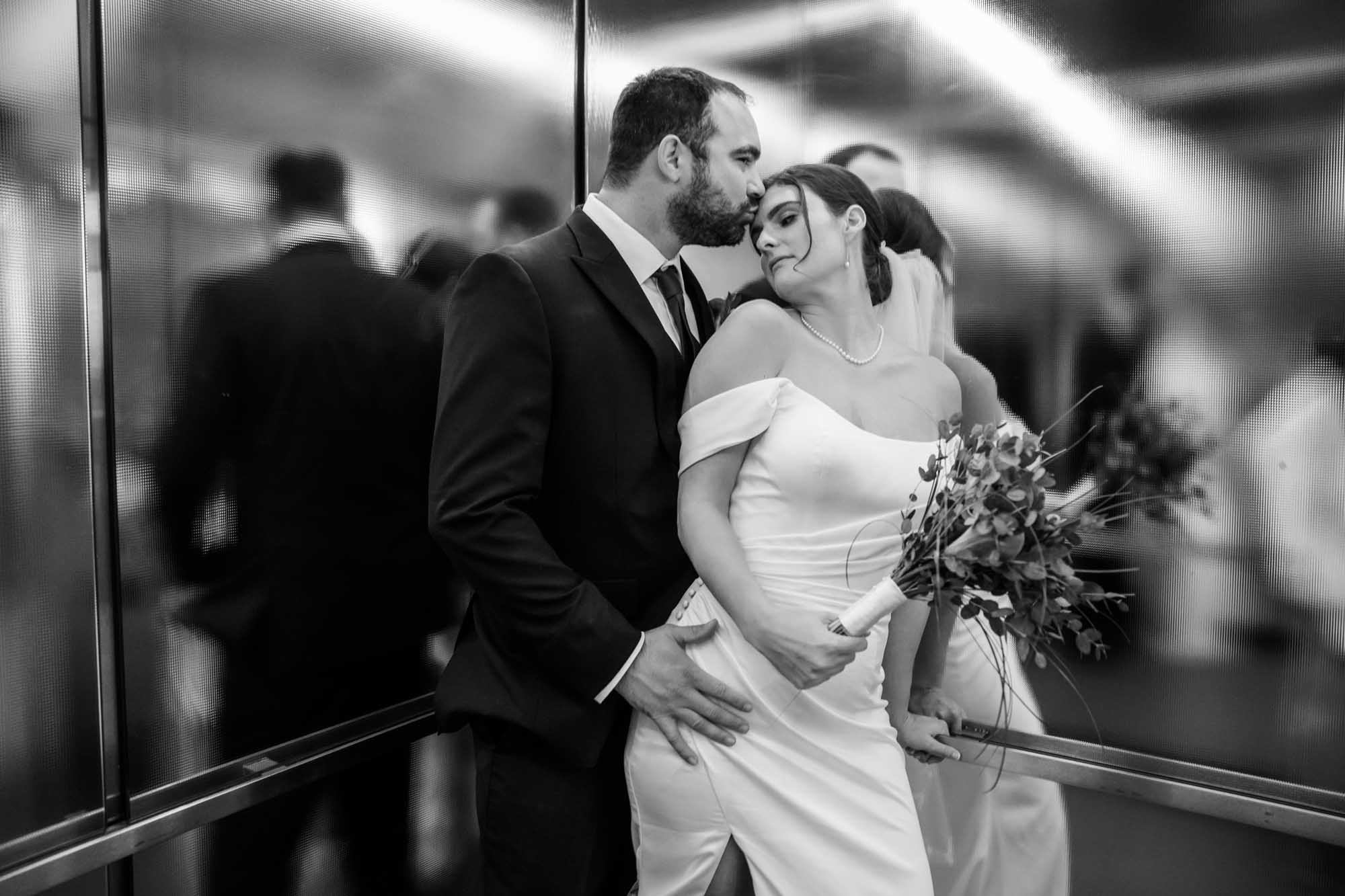 Calgary wedding photographer, bride and groom on their wedding day at the Central Library, candid, documentary, storytelling photography